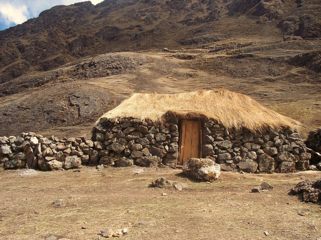 A house on the Lares Trek We actually went inside this house. The bed was made of straw, the same as the roof, and Guinea Pigs scurried along the floor. I think it's beautiful.