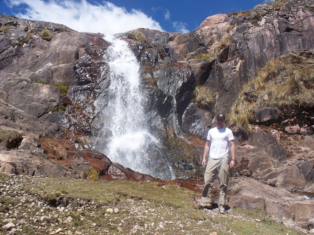 Waterfall in the Lares Valley We raced ahead of the group by a couple kilometers which gave us a chance to wander around our lunch spot. We came across this very cold waterfall along the way.